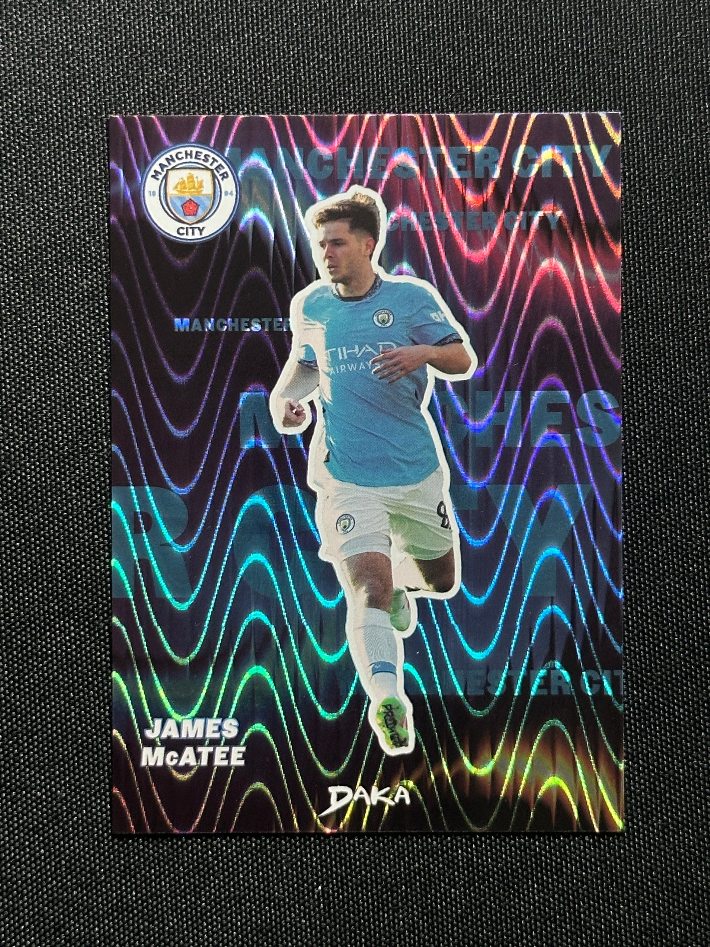 James McAtee Numbered Parallel 052/149 - Daka Manchester City Top Audience 2024/25