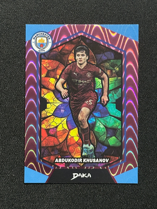 Abdukodir Khusanov Numbered Parallel 64/99 - Daka Manchester City Top Audience 2024/25