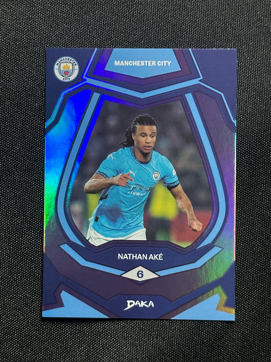 Nathan Ake Numbered Parallel 103/199 - Daka Manchester City Top Audience 2024/25