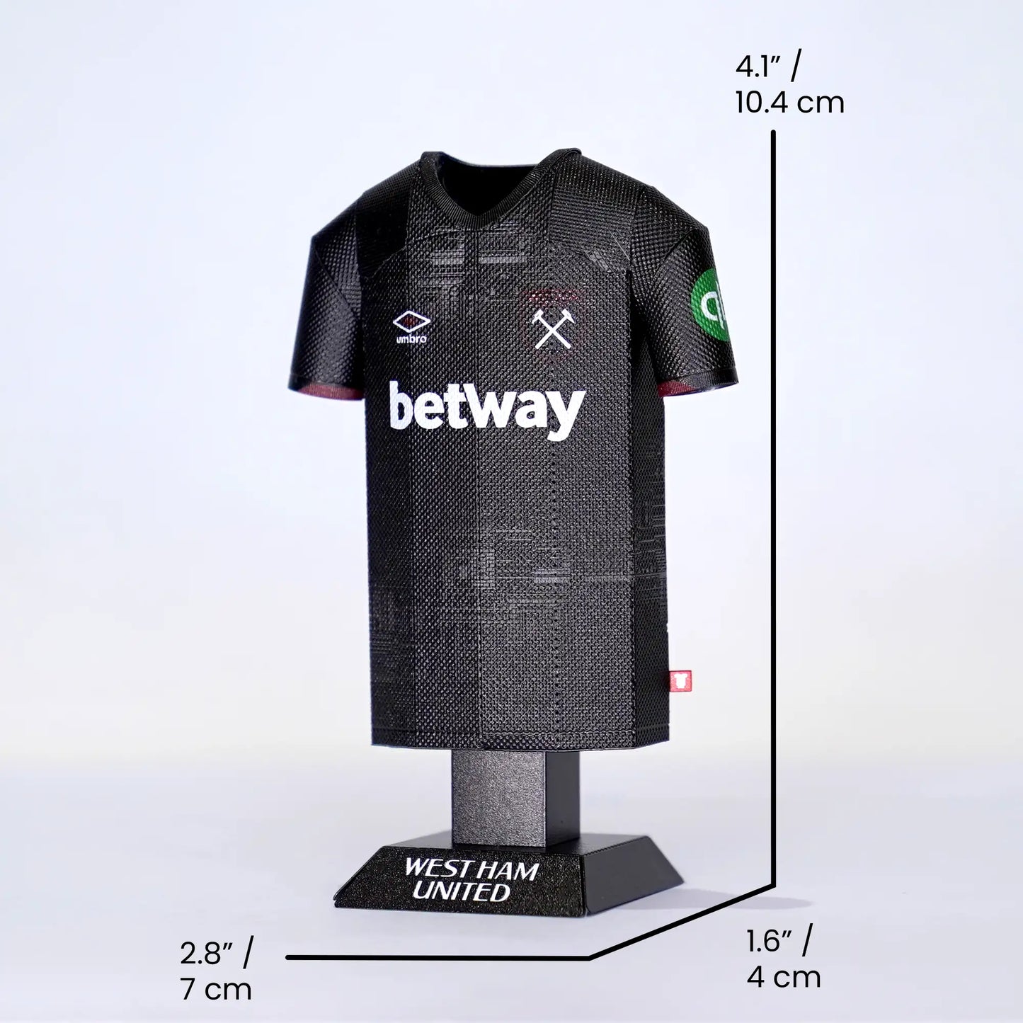 West Ham 24/25 away shirt collectible, made from metal, with measurements showing size in centimetres