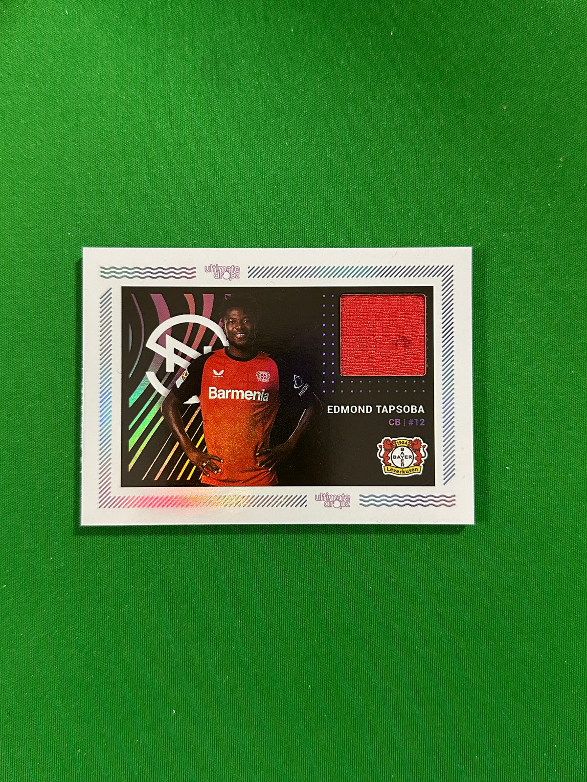Edmond Tapsoba Match-worn Patch 36/99 - Ultimate Dropz Bayer 04 Leverkusen Supernova 2024 - front