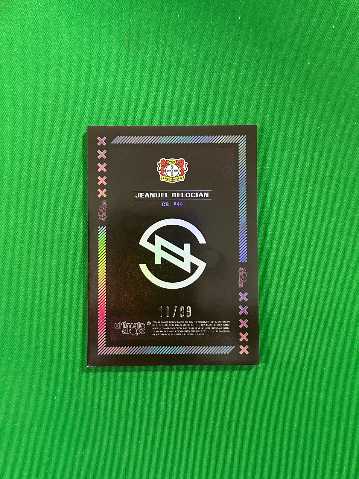 Jeanuël Belocian Numbered Parallel 11/99 - Ultimate Dropz Bayer 04 Leverkusen Supernova 2024 - back