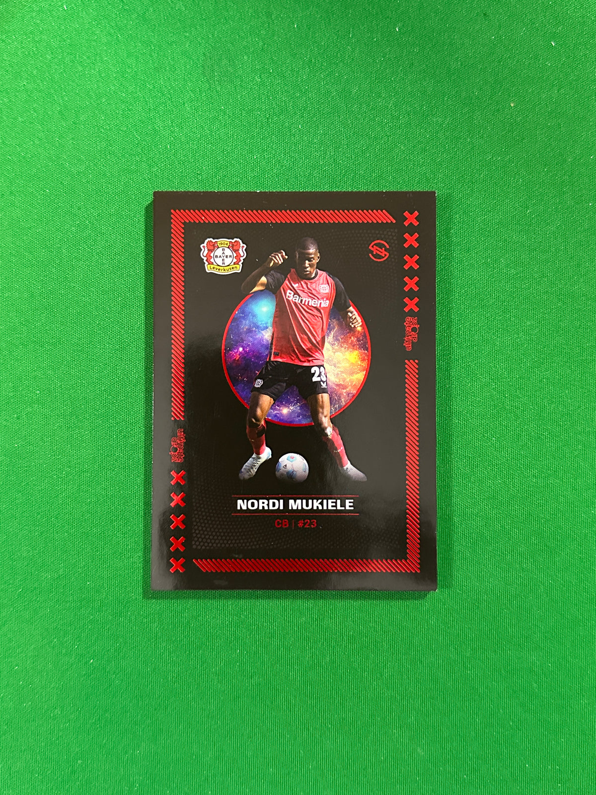 Nordi Mukiele Numbered Parallel 08/27 - Ultimate Dropz Bayer 04 Leverkusen Supernova 2024 - front