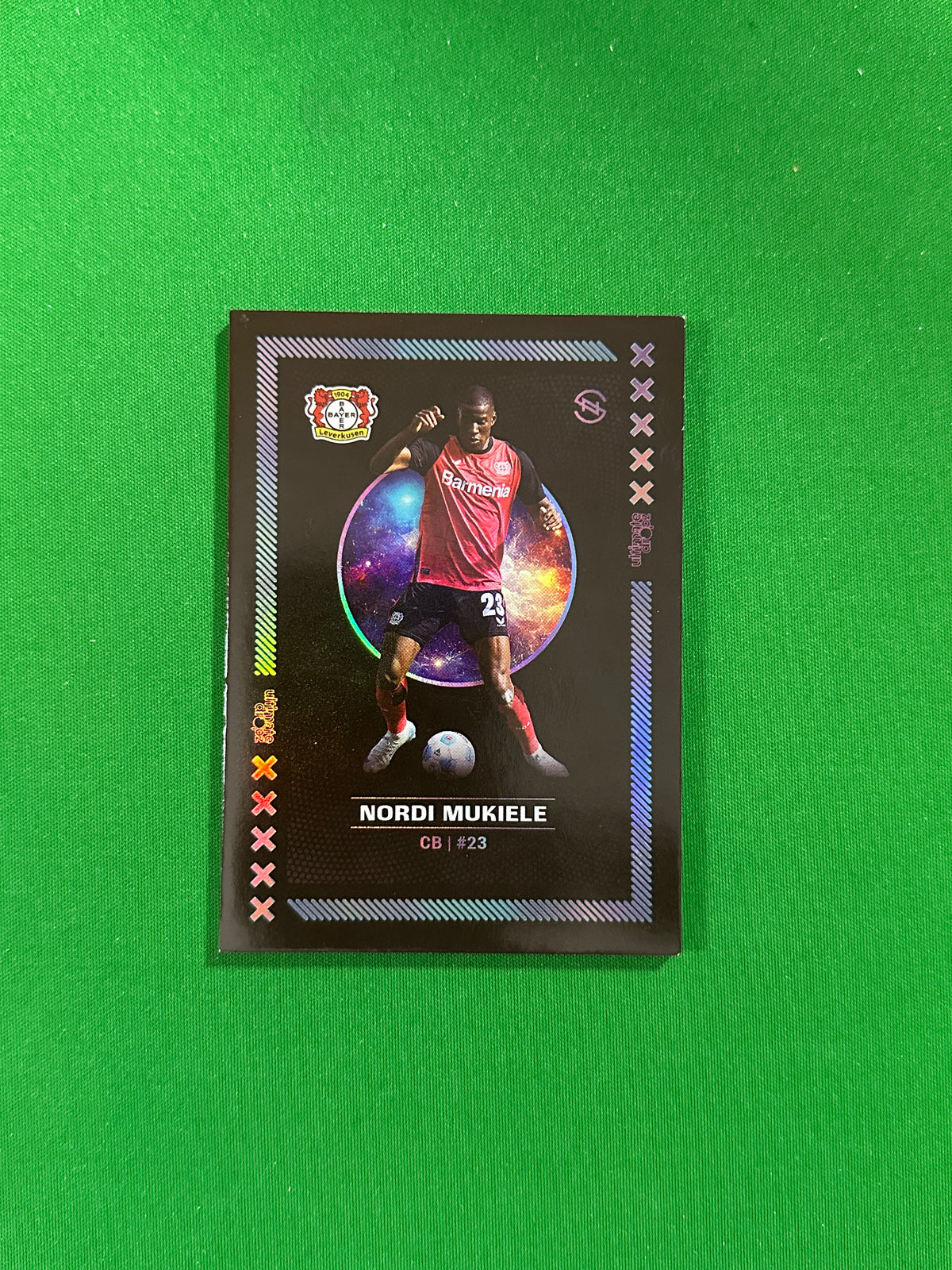 Nordi Mukiele Numbered Parallel 54/99 - Ultimate Dropz Bayer 04 Leverkusen Supernova 2024 - front