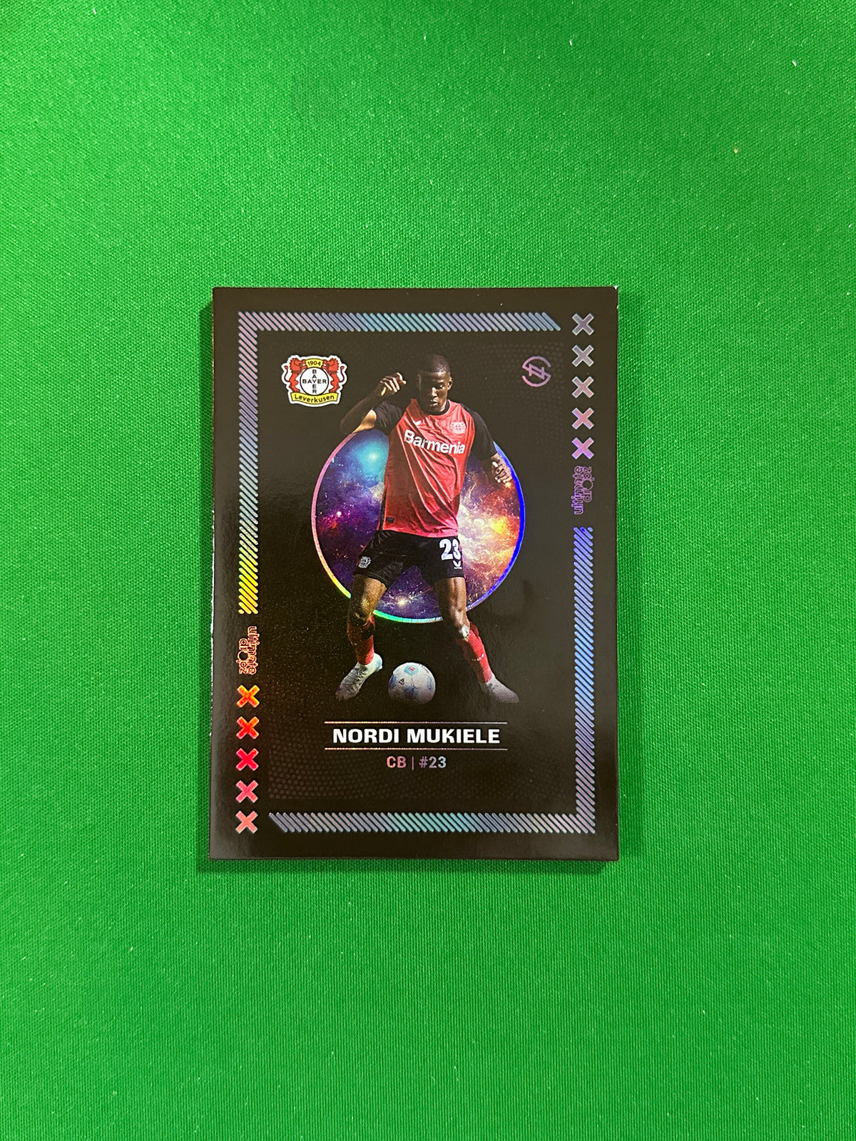 Nordi Mukiele Numbered Parallel 82/99 - Ultimate Dropz Bayer 04 Leverkusen Supernova 2024 - front
